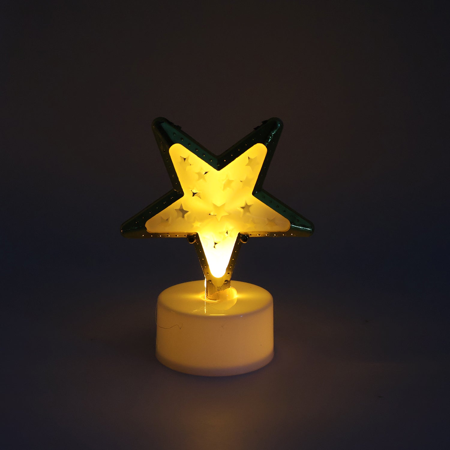 Decorative Star Shaped Flameless LED Candles (4 Pc) Decorative Star Shaped Flameless LED Candles (4 Pc)